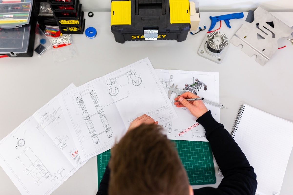 Engineer reviewing PCB design and hardware development